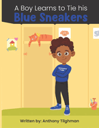 A boy learns to tie his Blue Shoes