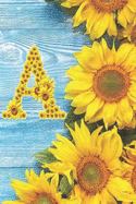A: Sunflower Personalized Initial Letter A Monogram Blank Lined Notebook, Journal and Diary with a Rustic Blue Wood Background
