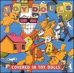 Covered in Toy Dolls